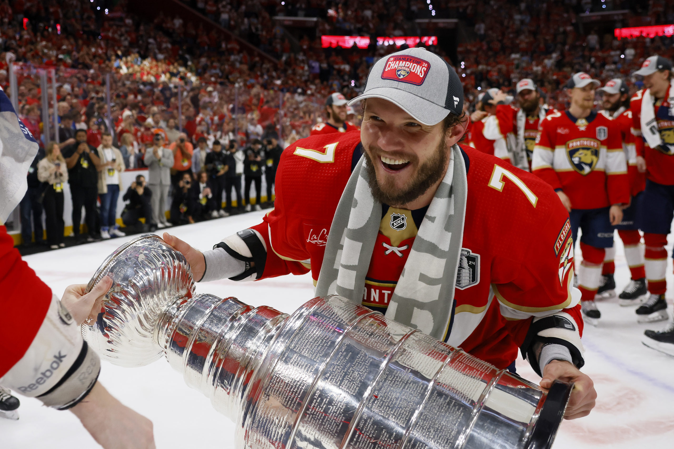 Dmitry Kulikov Holds the Stanley Cup